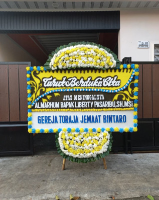 Papan Bunga Duka di Yapsi